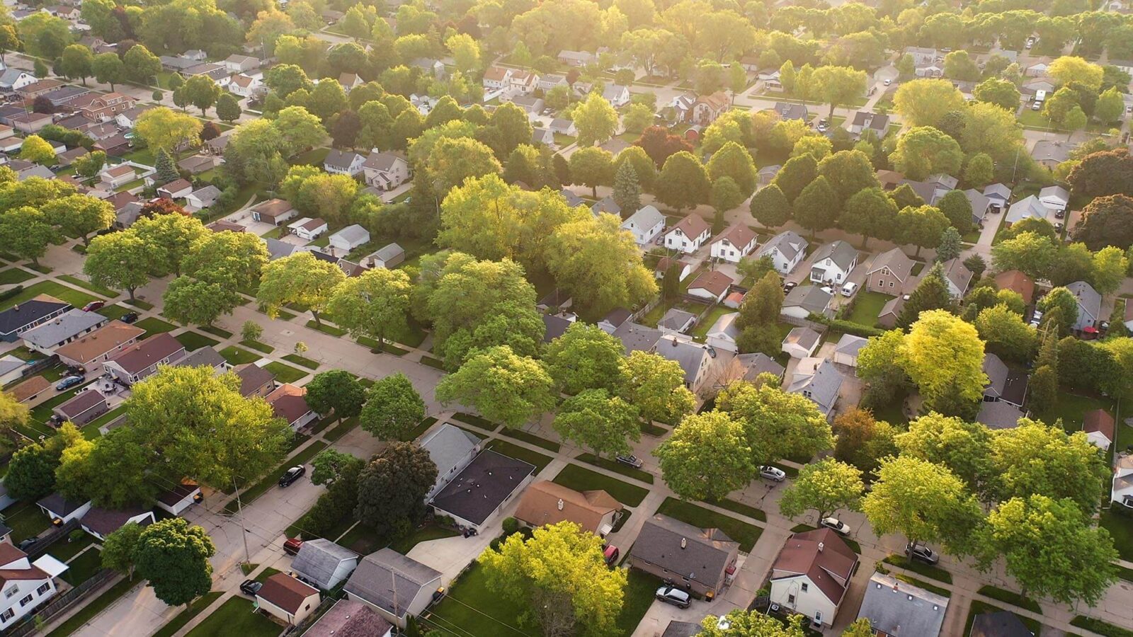 Streets lined with houses and trees.