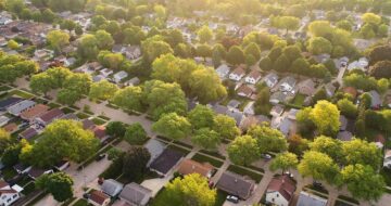 Streets lined with houses and trees.